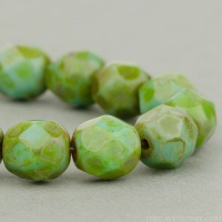 Round Faceted (6mm) Turquoise Green Opaque with Picasso