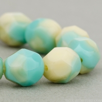 Round Faceted (6mm) Turquoise Ivory Mix Opaque
